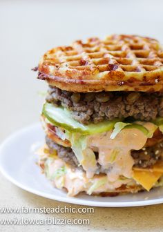 a close up of a waffle sandwich on a plate