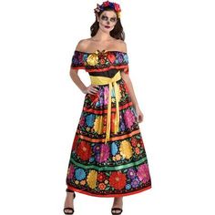 a woman wearing a colorful mexican dress with flowers on the waist and an off shoulder top