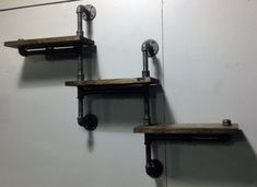 Industrial Three Tier Pipe Shelf (Pick your own stainMade with 1/2black pipe and 1x6 woodShelves are 15wideHardware included The wood used is pine woodStain options Aged Gray Black Ebony Espresso Golden Oak Honey Mocha Navy No Stain Phantom Grey Barn Red Red Mahogany Walnut Weathered Oak Dimensions 39wide 6depth 31tall We can customize any pieces to fit your needsJust let us know how we can help. Black Pipe Shelf, Industrial Shoe Rack, Three Tier Shelf, Shoe Organizer Entryway, Pipe Shelf, Wall Shelving Units, Triangle Shelf