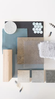 various materials are arranged on top of each other, including carpet and wall coverings