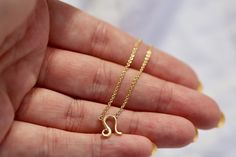 Gold Minimalist Leo Zodiac Symbol on a Delicate Cable Chain made with an Adjustable Chain Perfect for layering. Gold filled Jewellery with a Sterling Silver Base, Waterproof everyday Magic, a perfect and Petite Leo Zodiac Symbol Necklace * Leo Zodiac Necklace * Thoughtful Gift for your Cherished Leo's * High quality  14K Gold filled piece (3microns) * Hypoallergenic Jewellery * Waterproof as well as Lead & Nickel free * Also available in Sterling Silver Introducing our 14K Gold Filled Leo Star Sign Necklace, a captivating and deeply meaningful piece of jewellery that pays homage to the celestial and astrological sign of Leo. Handcrafted with precision and designed for layering, this exquisite necklace graces a delicate cable chain, adorned with a minimalist Leo symbol delicately textured f Leo Gift Ideas, Leo Zodiac Symbol, Leo Zodiac Necklace, Leo Pendant, Leo Symbol, Minimalist Gold Necklace, Star Sign Necklace, Space Things, Leo Necklace