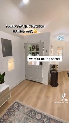 an empty room with a door that says, shed to tiny house under 25k want to do the same?