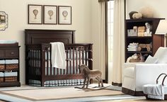 a baby's room with a crib, rocking horse and other items in it