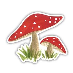 two red mushrooms sitting on top of green grass with white dots in the middle and one mushroom