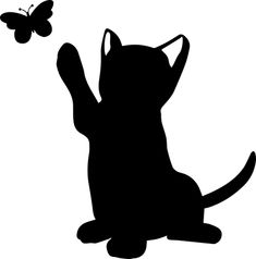 a black and white silhouette of a cat catching a butterfly