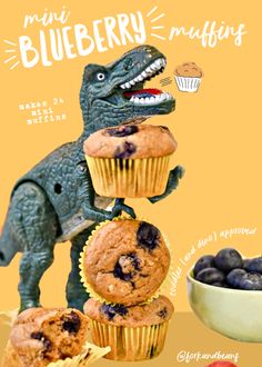 an image of blueberry muffins and a dinosaur