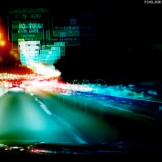 blurry photograph of city street lights at night