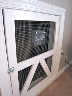 a dog door with a sign on it