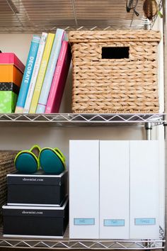 a shelf filled with lots of different types of makeup and eyeglasses on top of it