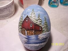 a painted rock sitting on top of a counter