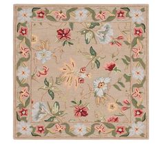 an area rug with flowers and leaves on the side, in light brown color scheme