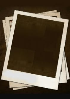 four polaroid frames are stacked on top of each other, with one being black and the other is white