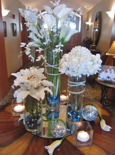 Adding a little bling to your wedding reception decor Lilies White, Silk Florals, Floral Arrangements Wedding, White Lilies, Perfect Wedding