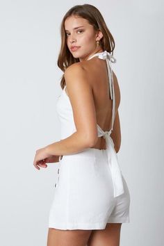 It's not your fault for your intense affection with the Lucky In Love White Cropped Two-Piece Skort Set! It's the perfect summer two-piece romper with halter tie back crop top and matching white skort. The high halter neckline connects to a set of adjustable straps that tie over the alluring open back, tie back sash on hem finishes the look. High, fitted waist tops off the white side slit skort with button down detail. Hidden back zipper/clasp. DETAILS & CARE Rayon/Cotton/Linen. Hand wash cold. Hem Finishes, Two Piece Romper, Skort Set, It's Not Your Fault, Tie Back Crop Top, Not Your Fault, White Skort, Your Fault, Boho Pink