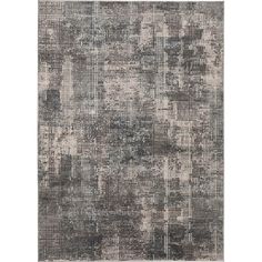 an area rug with grey and white squares