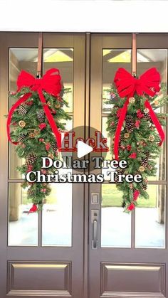 two christmas wreaths are hanging on the front door