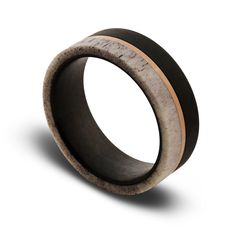 Do you want a ring that is not your run of the mill wedding band? What about a ring that tells a story? There’s no doubt this ring will capture the attention of others and will be a constant conversation starter. Made from Black Tungsten Carbide, deer antler, and and copper, this ring holds its own in craftsmanship and quality. We guarantee you’ll get compliments with this ring! DON’T KNOW YOUR SIZE? Don’t worry, you can select “reserve my ring and request sizer” above and we’ll send you a ring Bathroom Decor Towels, Grandmillenial Style, Mill Wedding, Wood Gift Box, Vintage Gentleman, Black Tungsten, Hard Metal, The Mill, Deer Antler