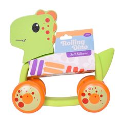 a green toy with orange wheels and a box on the back that says rolling dino