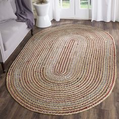 a round rug on the floor in a living room