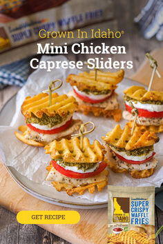 mini chicken caprese sliders on a platter with chips in the background