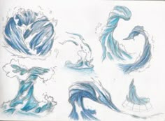 some blue and white drawings on a piece of paper with water splashing over it