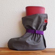 Eco-friendly ShoeShoes galoshes protect your shoes in a stylish way. Galoshes are made of gray artificial leather and 2cm quality elastic purple band with velcros.  Reusable shoe protectors are for both adults and children. Overshoes' sizes are from 7-15 inches (18-38cm) which means 27-41 EU size and can be sewn any size if requested. You wear the galoshes easily  like wearing oversized socks. It's very practical to wear these washable shoe covers over muddy boots. Cleaning galoshes is easier than cleaning boots. Washable gently by hand with cold water or by washing machine up to 30Co. These rain clothes for shoes are designed for two purposes:  1-OUTDOOR - To keep your shoes clean in muddy / rainy environments and to keep the places: You can wear them while walking the dog in nature or wh Oversized Socks, Dog In Nature, Shoe Protectors, Rain Clothes, Muddy Boots, Rain Accessories, Car Shoe, Shoes Boot, Take Off Your Shoes