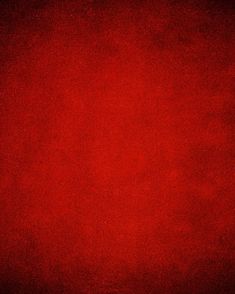 a red background that is very soft and has been used as a backdrop or wallpaper