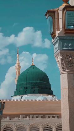 a large green dome on top of a building