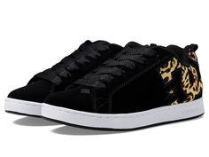 DC Court Graffik W - Women's Skate Shoes : Black/M Gold : A modern classic, the DC Court Graffik W casual shoes deliver with a clean silhouette and bold logo detail. Casual sneakers with heavy-duty suede, sturdy action nubuck, or soft and resilient action leather upper for abrasion-resistance and durability. Foam-padded tongue and collar for added comfort and support. Textile lining offers breathability. Internal elastic tongue holders for added foot stability. Rubber cupsole with iconic pill pattern provides grippy wear and durability. Imported. Measurements: Weight: 10 oz Product measurements were taken using size 7, width B - Medium. Please note that measurements may vary by size. Suede Skate Shoes For Streetwear, Suede Lace-up Skate Shoes For Streetwear, Suede Cushioned Lace-up Skate Shoes, Suede Skate Shoes With Cushioned Footbed For Streetwear, Suede Skate Shoes With Perforated Toe Box For Streetwear, Urban Suede Skate Shoes With Round Toe, Suede Skate Shoes With Rubber Sole For Streetwear, Urban Round Toe Suede Skate Shoes, Suede Skate Shoes With Cushioned Footbed