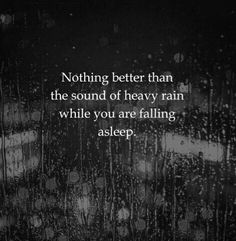 rain falling down on the window with a quote about nothing better than the sound of heavy rain while you are falling asleep