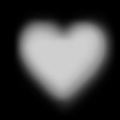 a black and white photo of a heart shaped object in the middle of the image