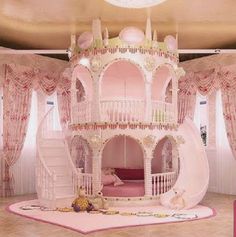 a doll house in the middle of a room with pink carpet and curtains on the walls