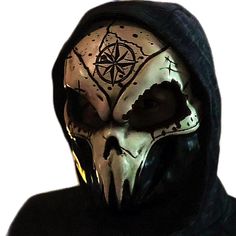 a person wearing a hooded mask with a pentagramus on it's face