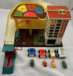 an assortment of toys including a toy car and slot machine