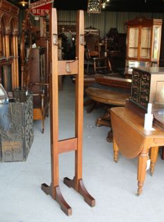 a room filled with lots of wooden furniture