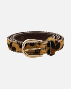 Never out of fashion, our luxe leopard print Dania belt is a fierce addition to any outfit. Made with real cowhide and featuring an elegant Italian gold buckle, it's perfect for dresses, jeans, jumpsuits, and rompers. Get creative with your looks – this belt offers endless styling possibilities. PRODUCT DETAILS Width: 0.78" Material: Vegetable Tanned Full Grain Leather Buckle: Sourced from Italy, Nickel free Buckle color: Gold The Made To Order Collection is available on a PREORDER ONLY basis. T Statement Belt Outfit, Outfit With Belt, Leopard Print Belt, Leopard Belt, Leather Belt Buckle, Jumpsuits And Rompers, Gold Belts, Studded Belt, Chic Accessories