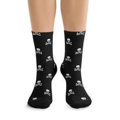 Jolly Roger Pirate Crew Socks. Black socks with a skull and cross bones pattern. Super stretchy with a durable print.  .: 58% Recycled Polyester 22% Nylon 15% Cotton 5% Elastane .: 200 needle knit premium socks .: One size fits all (W's size 5 US up to M's size 12 US) Pirate Crew, Skull And Cross Bones, Cross Bones, Jolly Roger, Black Socks, A Skull, Knitting Needles, Mens Socks, Crew Socks