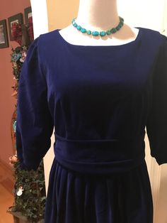 Stunning shade of blue velvet special occasion dress. Size is XL equal to US size 12-14, length from shoulder to bottom hem is 43". Fully lined with back zipper. Princess sleeves with rouching elastic at wrist., stunning color, better than pics show. Dry clean only Blue Sparkle Velvet Dress, Blue Fitted Velvet Dress, Blue Velvet Embroidered Dress, Blue Fitted Long Sleeve Velvet Dress, 80s Blue Velvet Dress, Blue Velvet Dress, Princess Sleeves, Special Occasion Dress, Velvet Dress