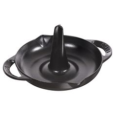 an iron frying pan with a black handle on the bottom and two handles in the middle