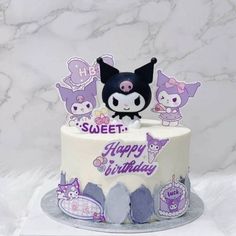 a birthday cake with an animal theme on it