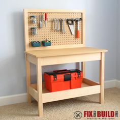 a wooden bench with tools on it