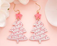 These light-weight pink glitter acrylic Christmas tree earrings are the perfect statement earrings to add an extra pop to your outfit! Acrylic is very lightweight so you can enjoy large, statement earrings comfortably all day. ♡ Made with pink glitter acrylic with engraved details (back is solid pink) ♡ Size: Approximately 2.75 inches in length measured from earring hook ♡ Earring hook is made from surgical stainless steel ♡ Care Instructions: ♡ - To clean: Wipe with a microfiber cloth to remove Pink Earrings For Christmas Party, Pink Earrings Christmas Gift, Pink Earrings As Christmas Gift, Pink Earrings For Christmas Gift, Pink Christmas Party Jewelry, Painted Earrings, Christmas Tree Earrings, Pink Christmas Tree, Glitter Acrylics