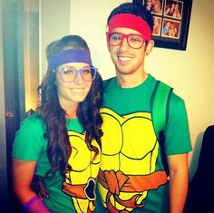 a man and woman dressed up in teenage mutant t - shirts for the costume contest