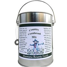 a metal bucket with a label on it that says country cornbread mix