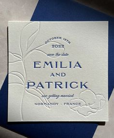 an image of a wedding card with the word'emila and patrick'on it