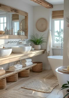 a large bathroom with two sinks and baskets on the floor in front of the bathtub