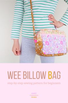 a woman holding a purse with the words wee pillow bag on it