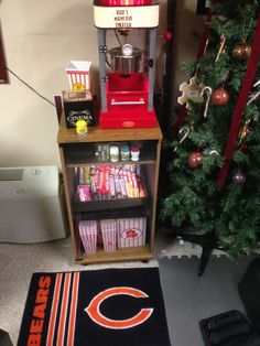 a chicago bears fan's room with a popcorn machine and christmas tree