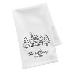 two white napkins with the words, the village and trees in black ink on them