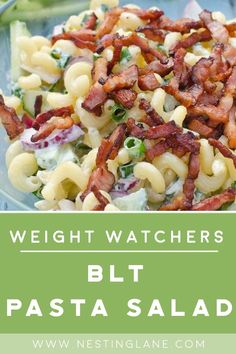 pasta salad with bacon, cheese and lettuce on it